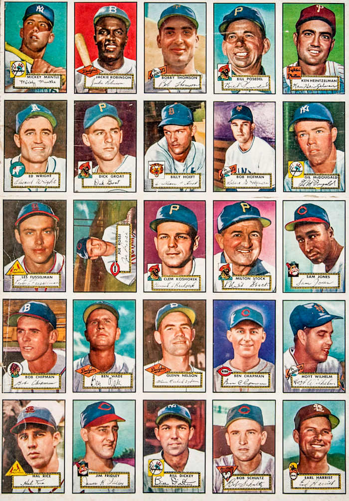Even a partial uncut spread—like this quarter of a 10 × 10 printing—can command big bucks because of the card (No. 311) in the top-left corner.